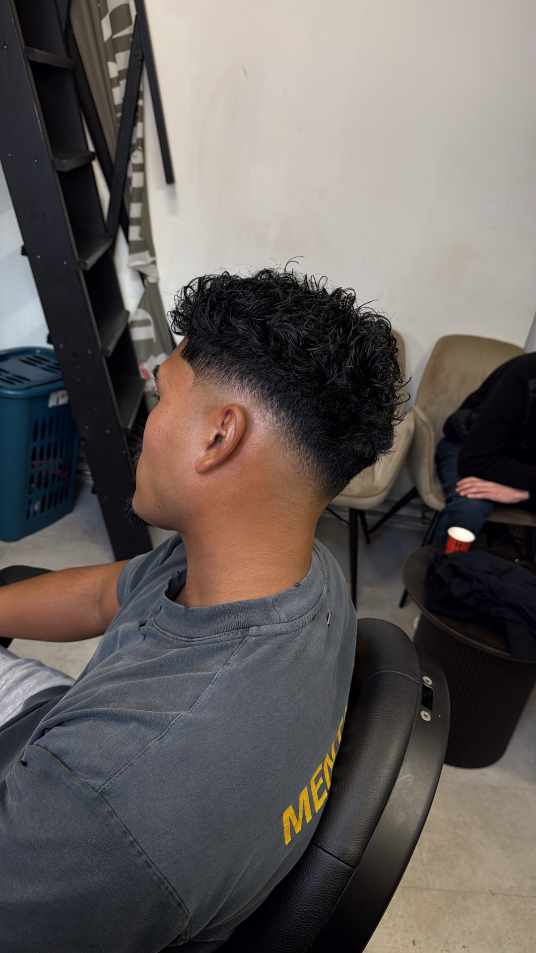 Curly mullet fade